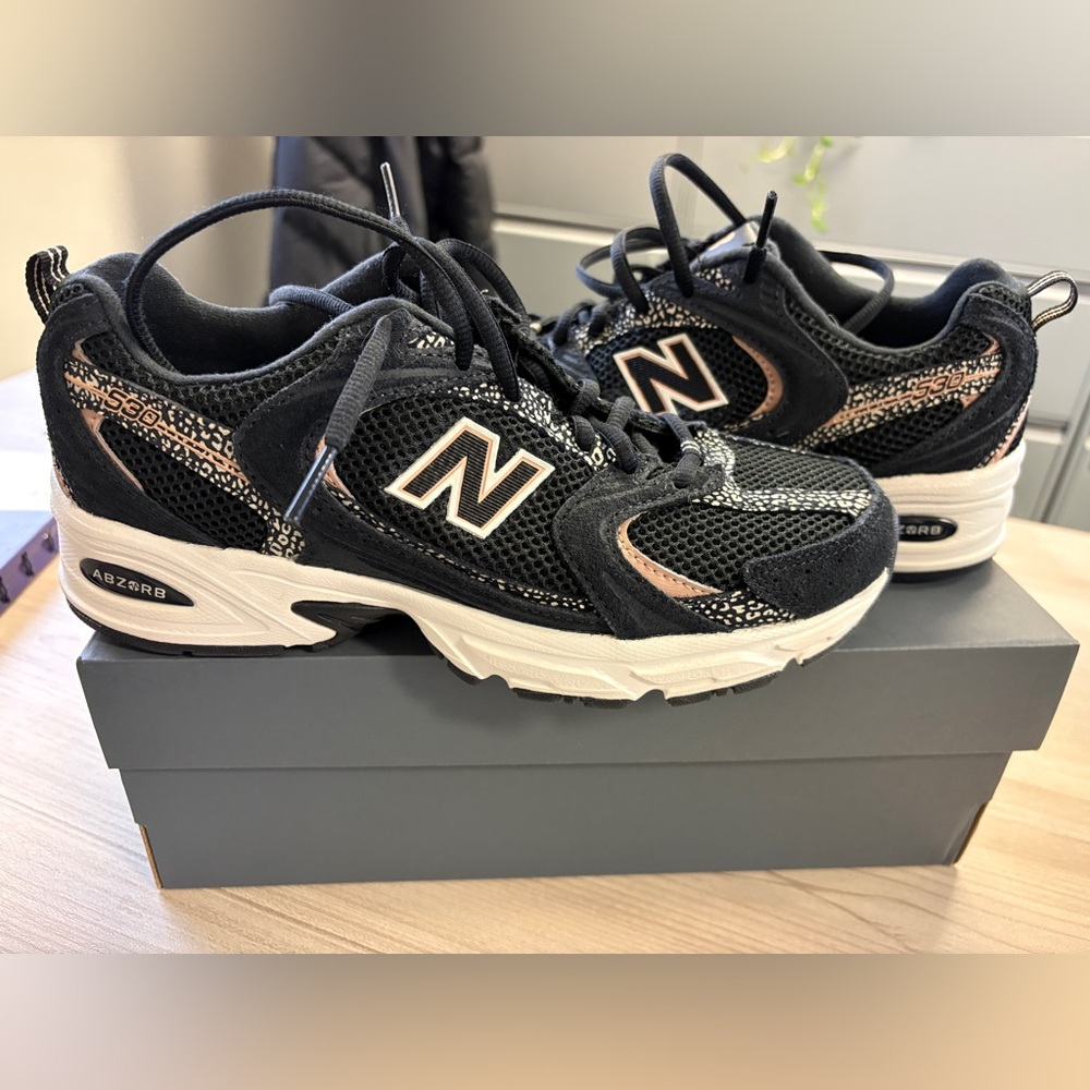 New Balance 530’s Black and White Athletic Shoes.